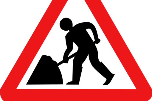 Verkehrsschild weiß, rot, schwarz mit Person die schaufelt