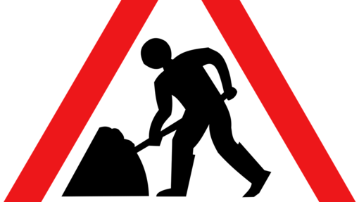 Verkehrsschild weiß, rot, schwarz mit Person die schaufelt
