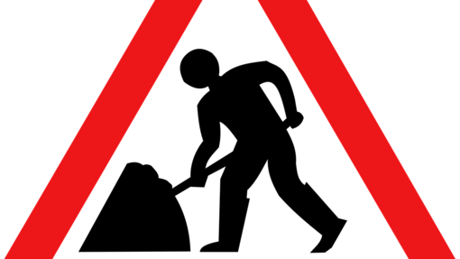 Verkehrsschild mit Person beim Schaufeln